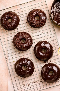 Chocolate baked donuts. top view..selective focus