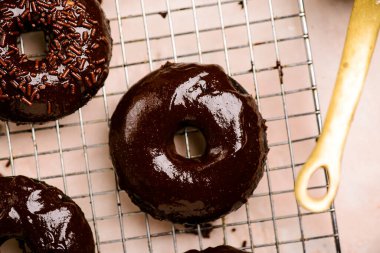 Chocolate baked donuts. top view..selective focus