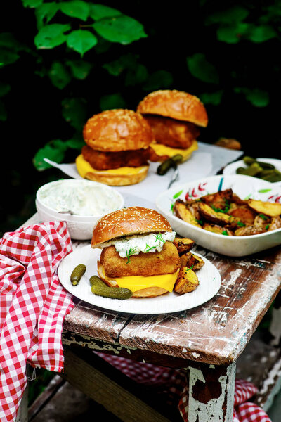 Fillet-o-fish and chips with tartare sauce.selective focus