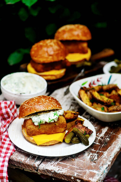 Fillet-o-fish and chips with tartare sauce.selective focus