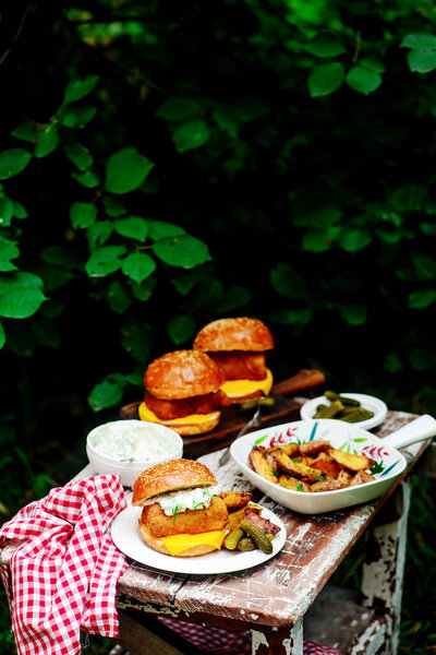 Fillet-o-fish and chips with tartare sauce.selective focus
