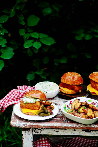 Fillet-o-fish and chips with tartare sauce.selective focus