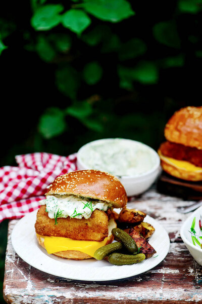 Fillet-o-fish and chips with tartare sauce.selective focus