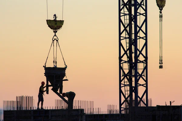 Pouring concrete into a newly built house — Stock Photo, Image