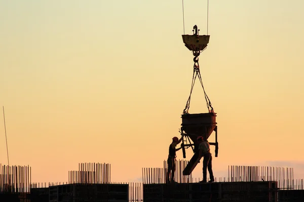 Pouring concrete into a newly built house — Stock Photo, Image