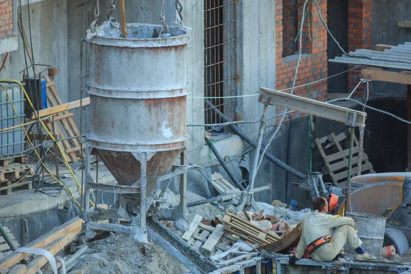 Pouring concrete into a newly built house — Stock Photo, Image