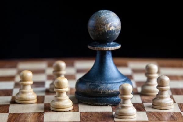 Wooden chess pieces Stock Photo