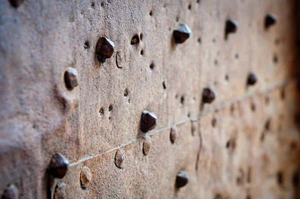 Old rusty metal with rivets — Stock Photo, Image