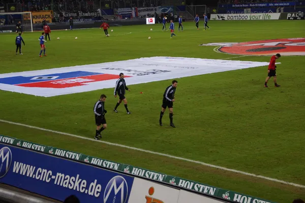 Refs warming-up — Stockfoto