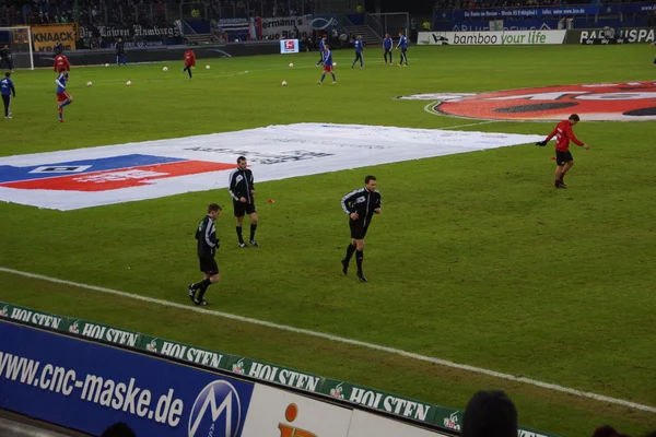 Refs warming-up — Stockfoto