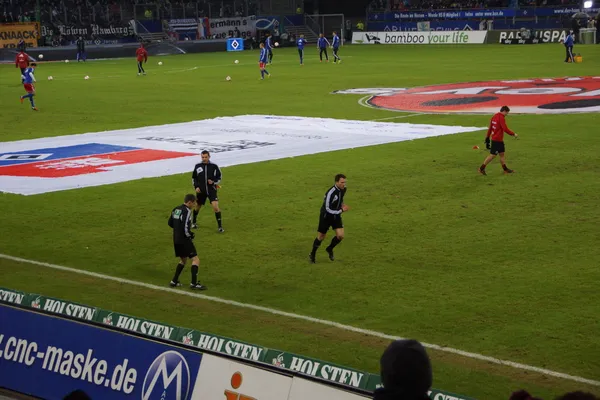 Refs warming-up — Stockfoto