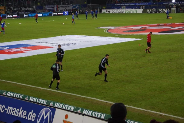 Refs warming-up — Stockfoto