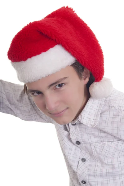 Handsome teenage boy with Christmas hat — Stock Photo, Image