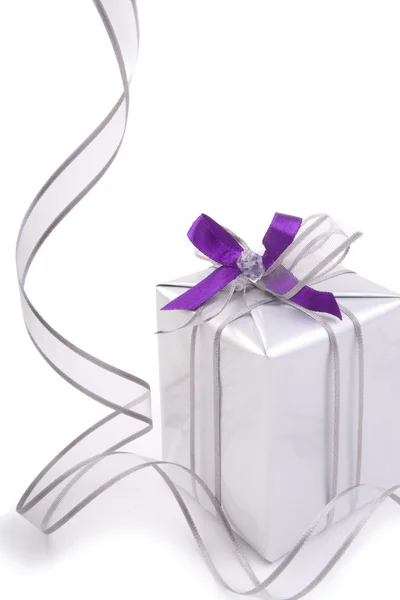 Present with silver ribbon Royalty Free Stock Photos