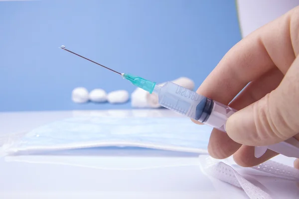 Holding Syringe — Stock Photo, Image