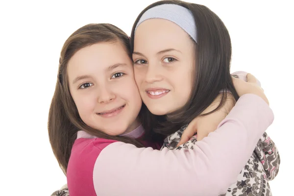 Beautiful young girls hugging — Stock Photo, Image