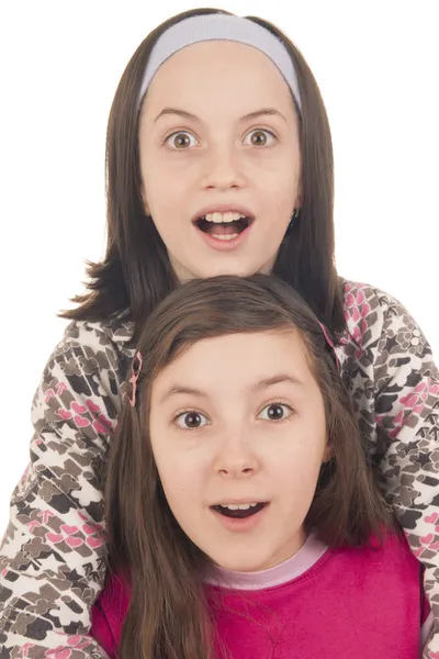 Dos chicas mirando sorprendidas — Foto de Stock