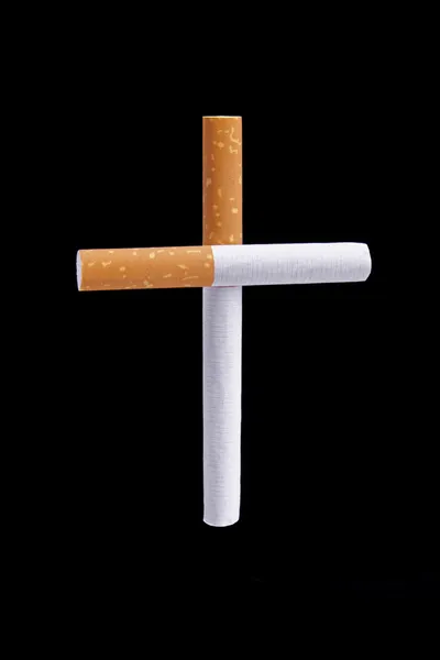 Cigaretter cross metafor — Stockfoto