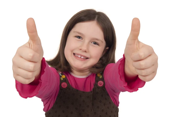 Beautiful little girl showing thumbs up — Stock Photo, Image