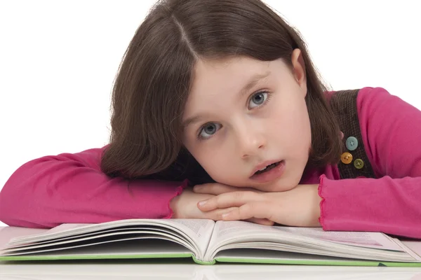 Beautiful little girl reading a book — Stock Photo, Image