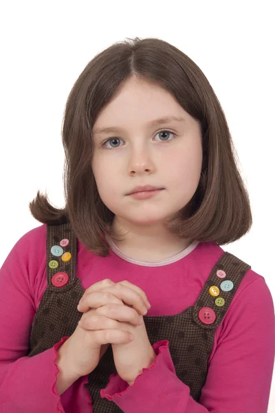 Hermosa chica rezando con los ojos abiertos —  Fotos de Stock