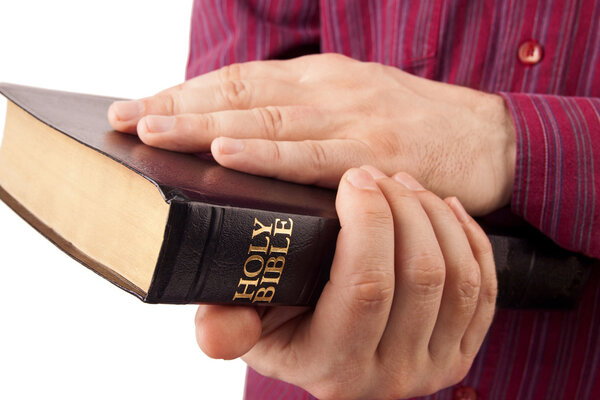 Man Holding a Bible
