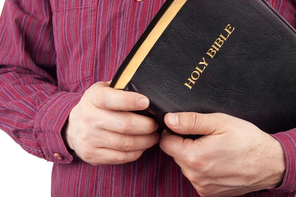 Homem segurando uma Bíblia — Fotografia de Stock