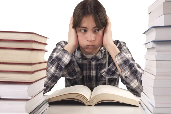 Teen boy learning at the desk — Stock Photo, Image