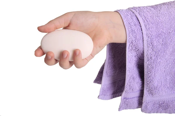 Seife in der Hand und Handtuch — Stockfoto