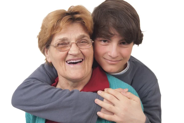 Kleinzoon knuffelen grootmoeder — Stockfoto