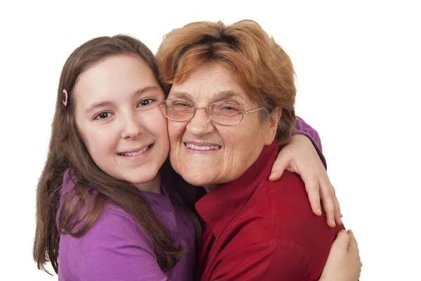 Grandmother and granddaughter hugging — Stock Photo, Image