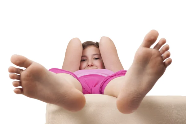 Beyaz arka plan üzerinde izole genç kızın ayak