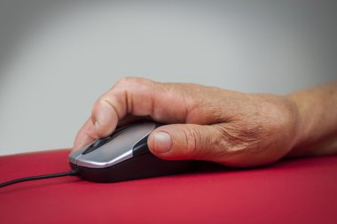 Rheumatoid arthritis hand holding computer mouse clipart