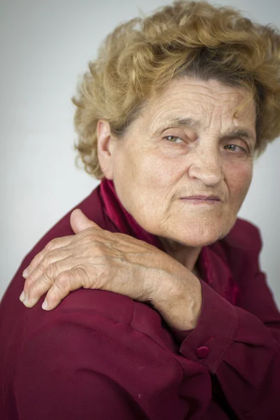 Senior woman having back ache — Stock Photo, Image