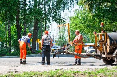 Repairing the road.