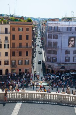 ROME-AUGUST 7: Fontana della Barcaccia and the Piazza di Spagna seen from the Trinità dei Monti on August 7,2013 in Rome, Italy. Fontana della Barcaccia is a Baroque fountain in Rome, Italy.