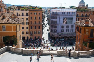 ROME-AUGUST 7: Fontana della Barcaccia and the Piazza di Spagna seen from the Trinità dei Monti on August 7,2013 in Rome, Italy. Fontana della Barcaccia is a Baroque fountain in Rome, Italy.