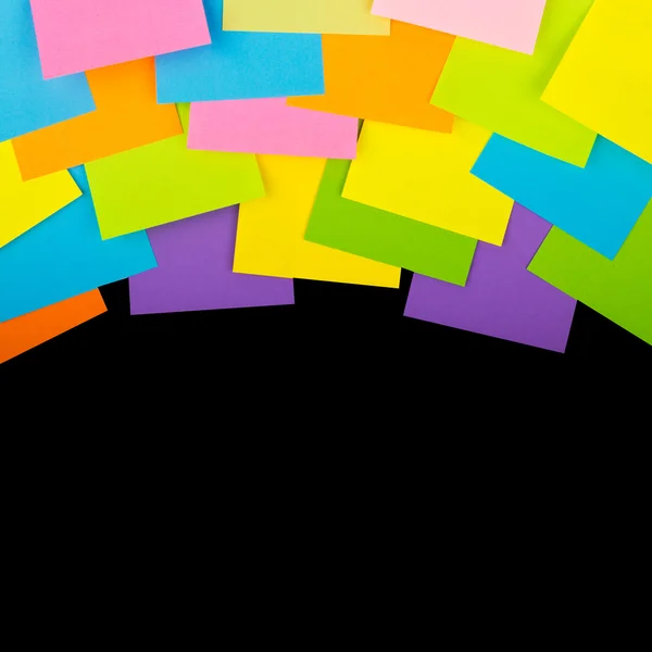 Gekleurde stickers op een zwarte achtergrond — Stockfoto