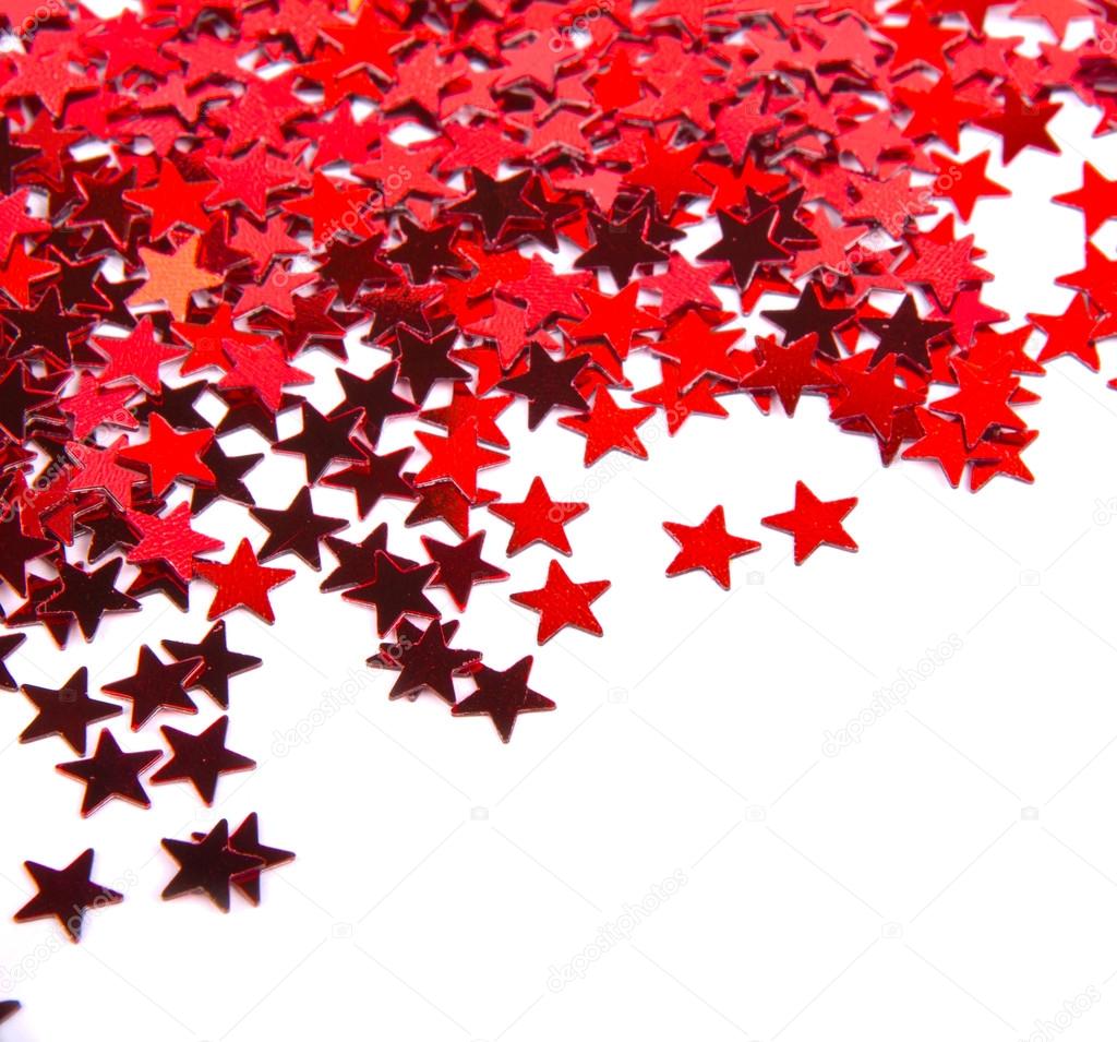 Red stars confetti isolated on white background