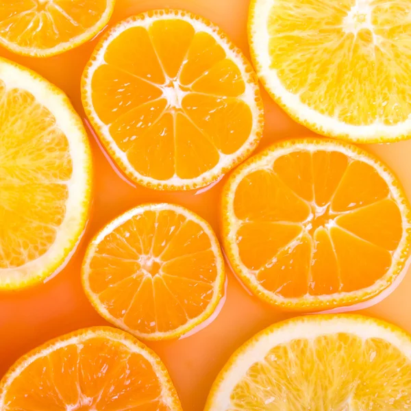 Fundo abstrato com citrinos de laranja e tangerina sl — Fotografia de Stock