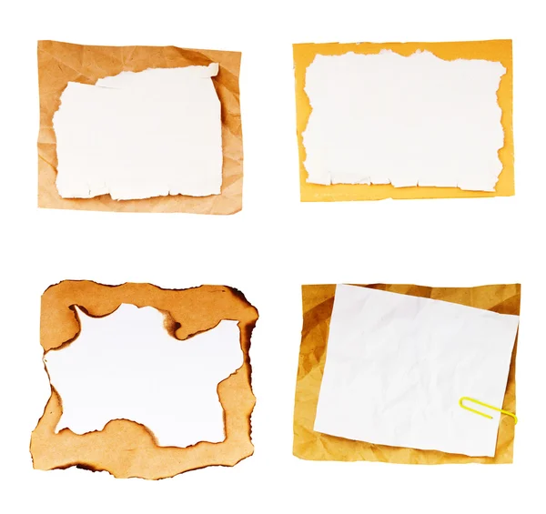 Folhas de papel antigas isoladas em fundo branco — Fotografia de Stock