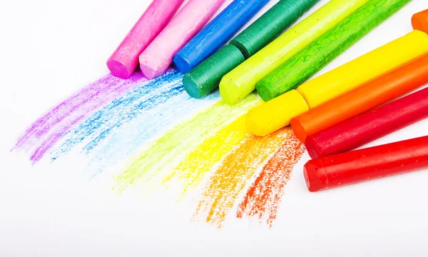 Óleo Pastel Crayons em um livro branco — Fotografia de Stock