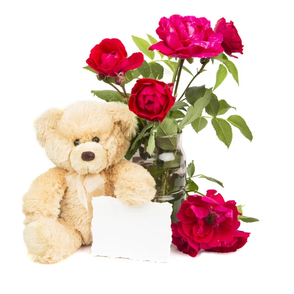 Teddybär und Blumen — Stockfoto