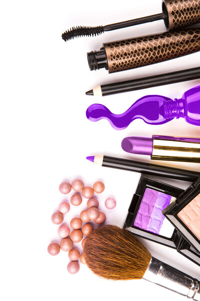 makeup brush and cosmetics, on a white background isolated, with