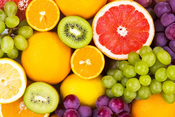 Antecedentes de muitas frutas exóticas diferentes — Fotografia de Stock