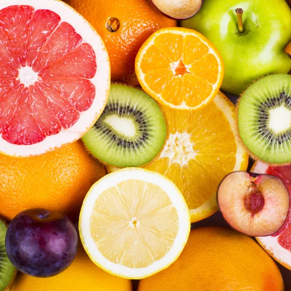 Antecedentes de muitas frutas exóticas diferentes — Fotografia de Stock