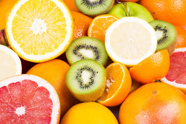 Sortimento de frutas suculentas fundo — Fotografia de Stock
