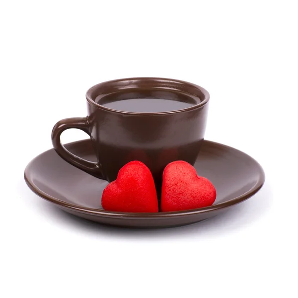 Kaffee, rote Bonbons, Geschenk und Rosen zum Valentinstag Stockbild