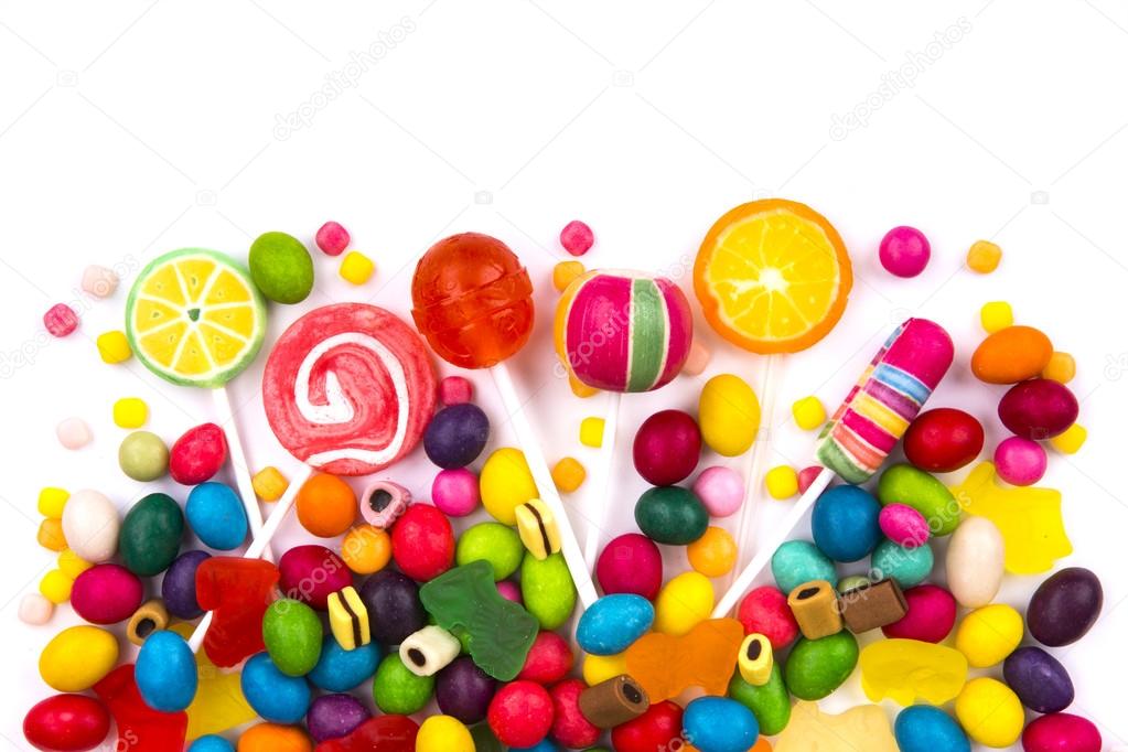 Mixed colorful candies isolated on white