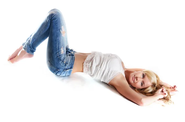 Linda loira de jeans sem fundo — Fotografia de Stock